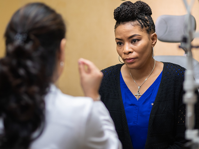 Dr. Roya Attar talks about how to properly clean contact lenses to patient and new contact user Crystal Lawshe.